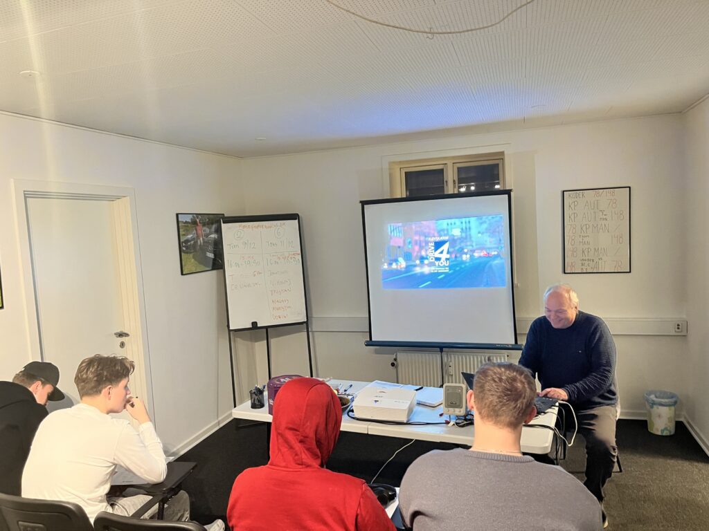 Bent og studenter i undervisning